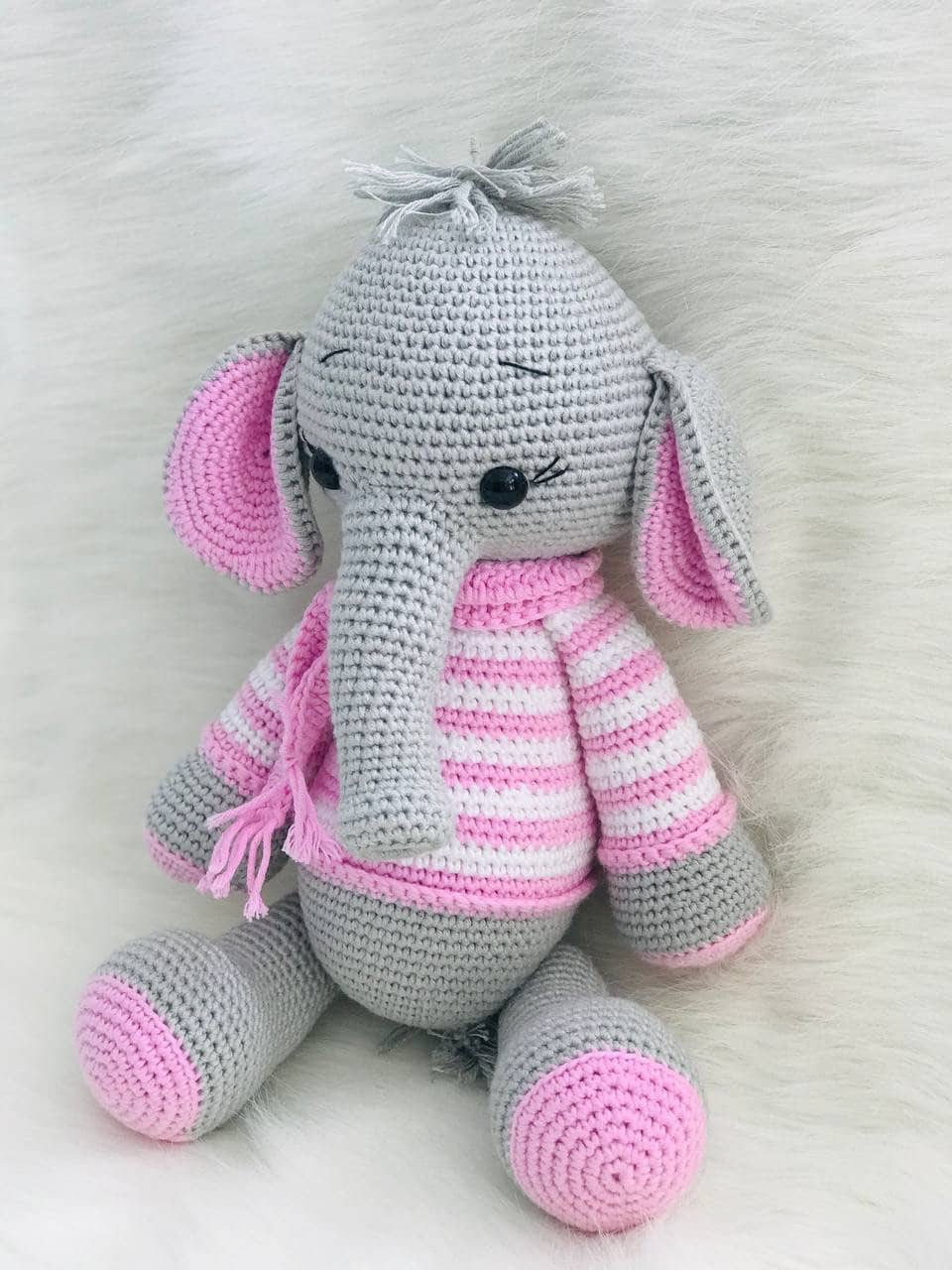 Organic crochet elephant toy made with Oeko-Tex 100 yarn, a safe and cuddly option for babies