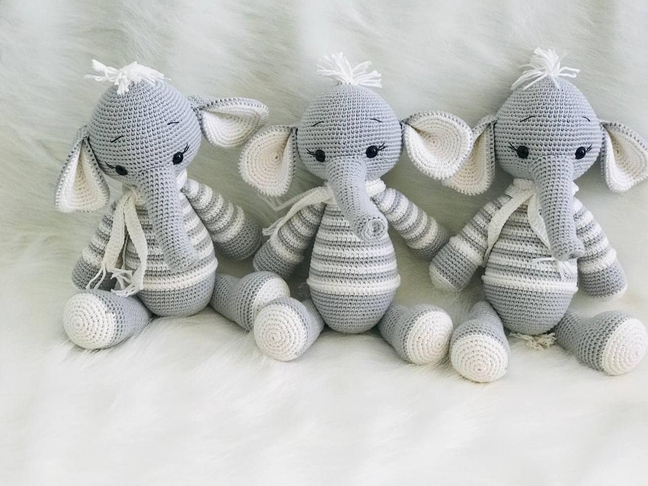 A soft and huggable crochet elephant toy, perfect for infants and young children