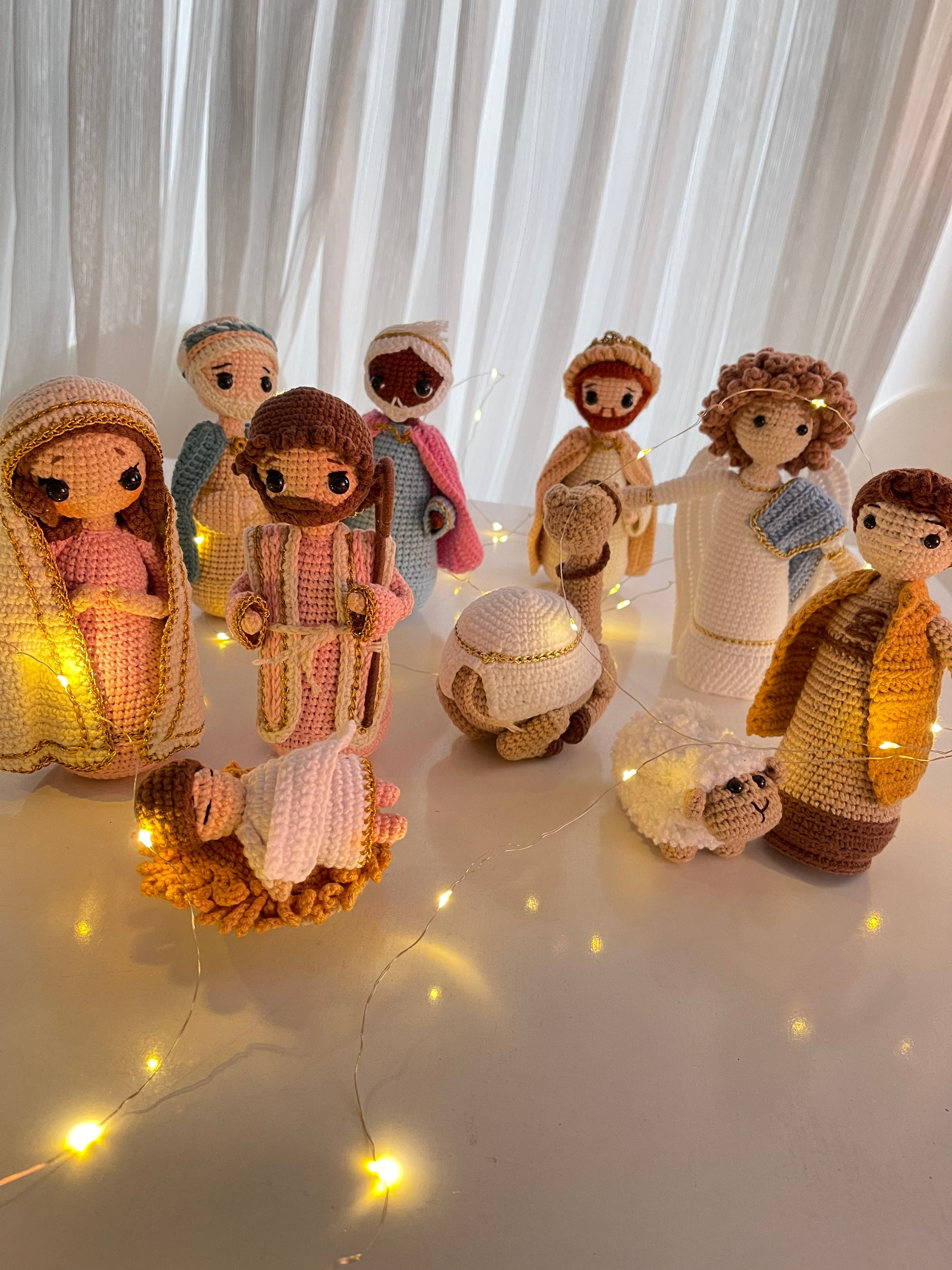 A beautifully detailed, handmade crochet Nativity scene featuring all the key figures of the Christmas story