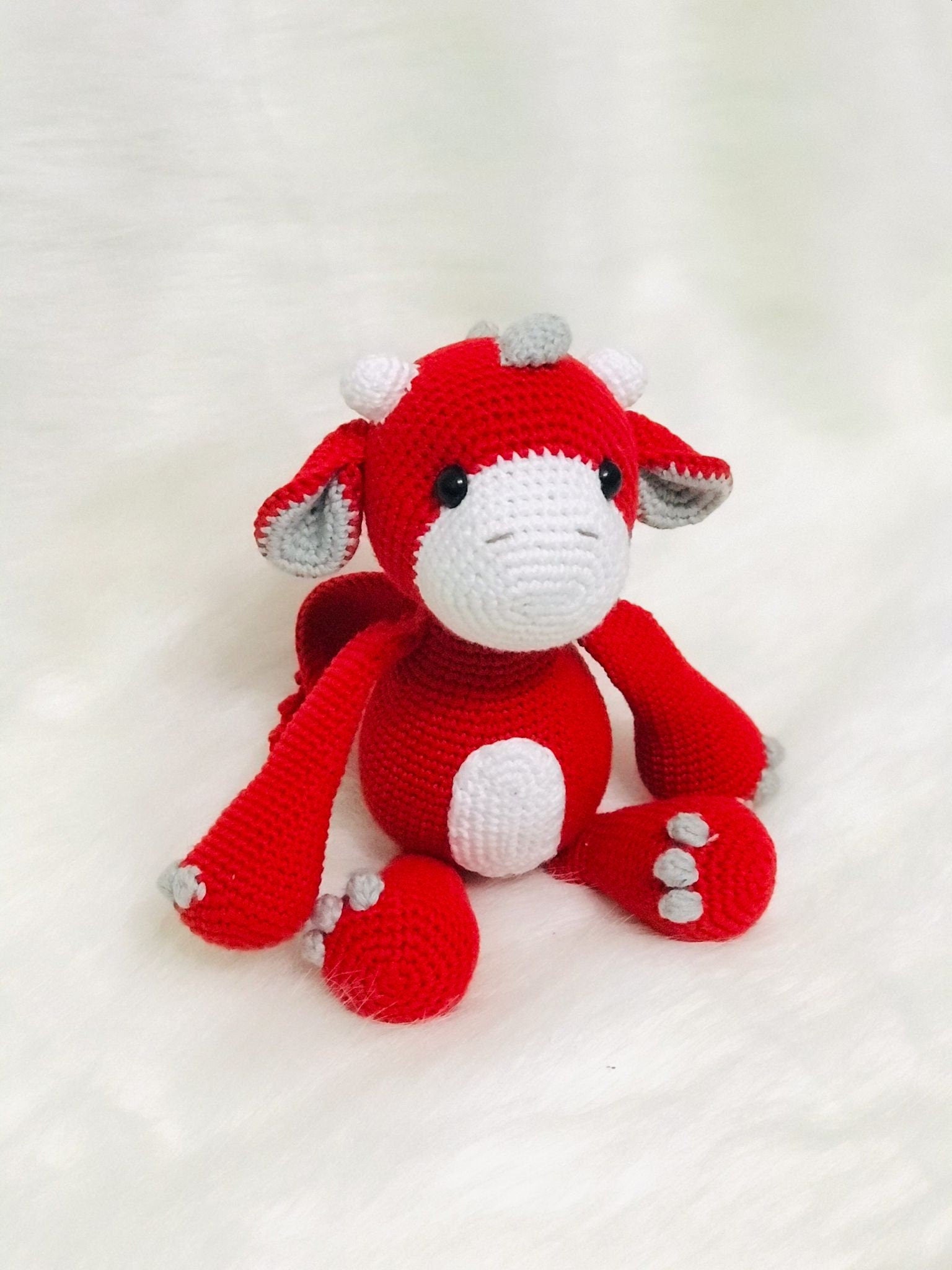 A soft and safe handmade baby dragon toy, UKCA approved for children