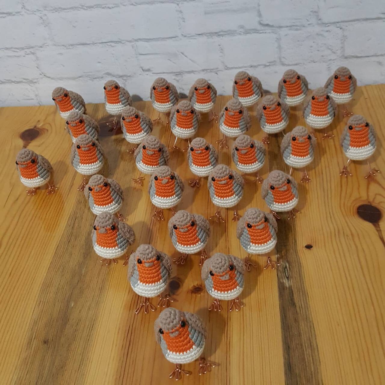 A small and cute crochet robin, ideal for home decor or as a thoughtful gift