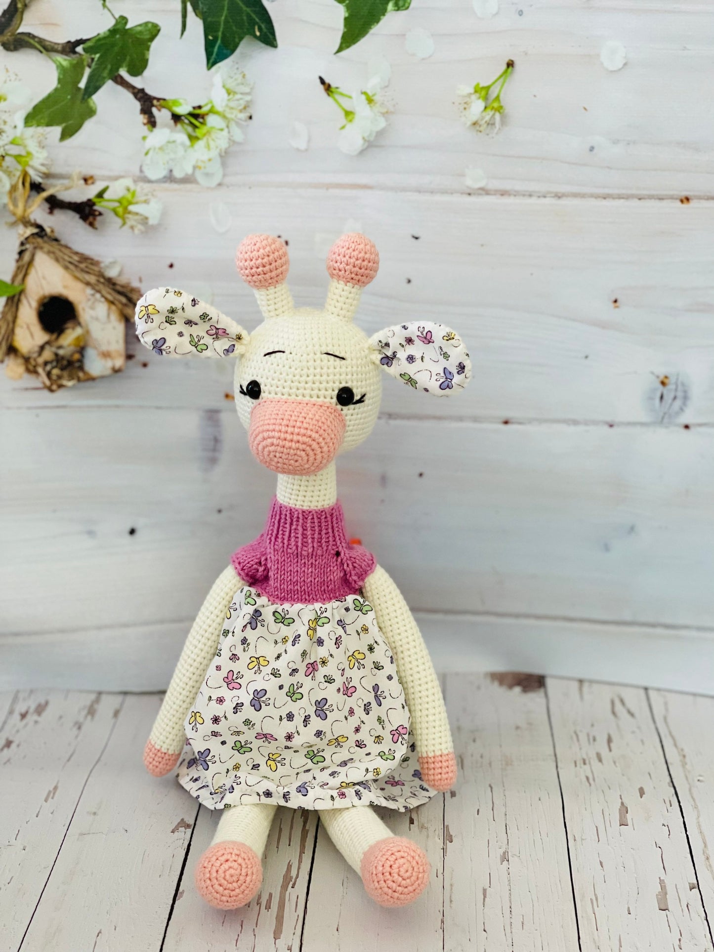 Hand-crocheted Princess Lady Giraffe Toy with a soft, fuzzy texture and long, floppy ears