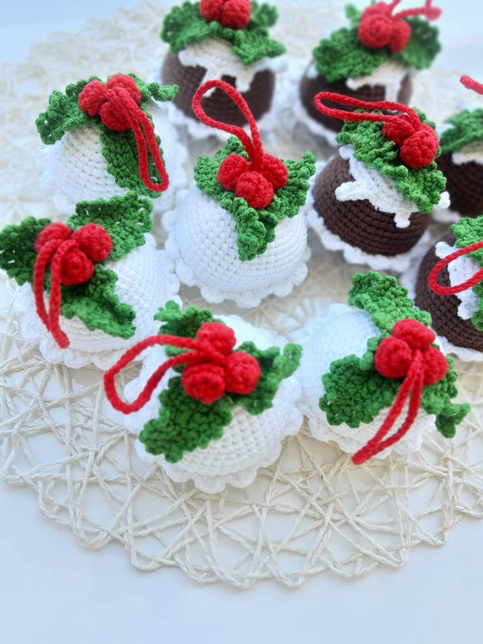 Crochet Christmas pudding ornament with chocolate and white colors, perfect for decorating your tree or adding a touch of holiday charm to your home decor. Handmade with love, this cute piece is sure to delight anyone who loves the festive season