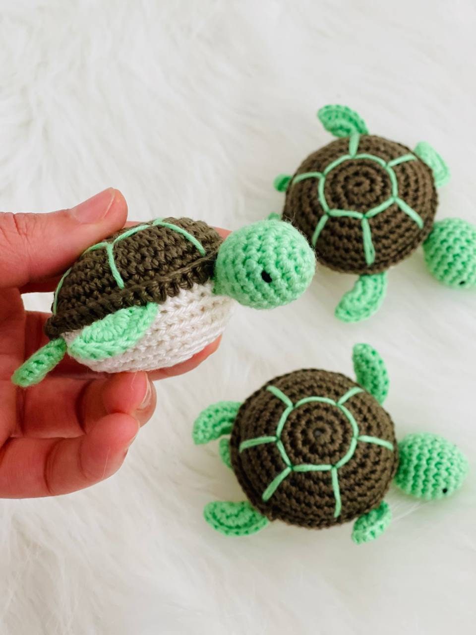 Handmade crochet baby turtle with its own egg, perfect for any turtle lover.The adorable turtle is meticulously crafted with soft and colorful yarn, and comes nestled inside a crocheted egg. Ideal as a baby shower gift or nursery decor.