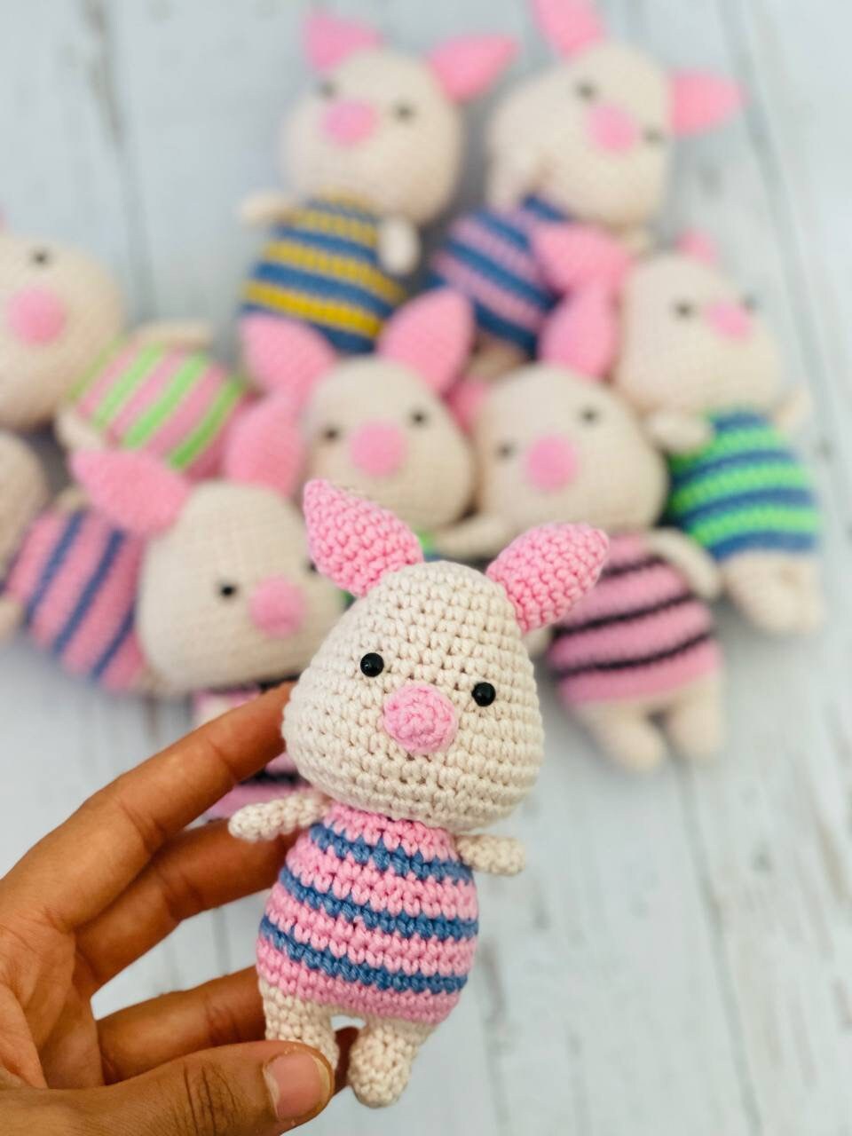Photo of handmade crochet miniatures cute and colorful animals including a bee, cow, panda, piglet, and koala. Perfect as a unique gift or collectible item.Each crochet animal is crafted using soft yarn and stuffed with hypoallergenic filling