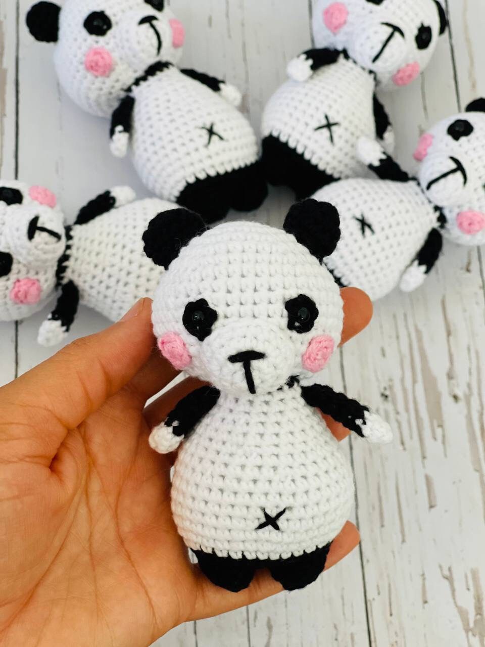 Photo of handmade crochet miniatures cute and colorful animals including a bee, cow, panda, piglet, and koala. Perfect as a unique gift or collectible item.Each crochet animal is crafted using soft yarn and stuffed with hypoallergenic filling