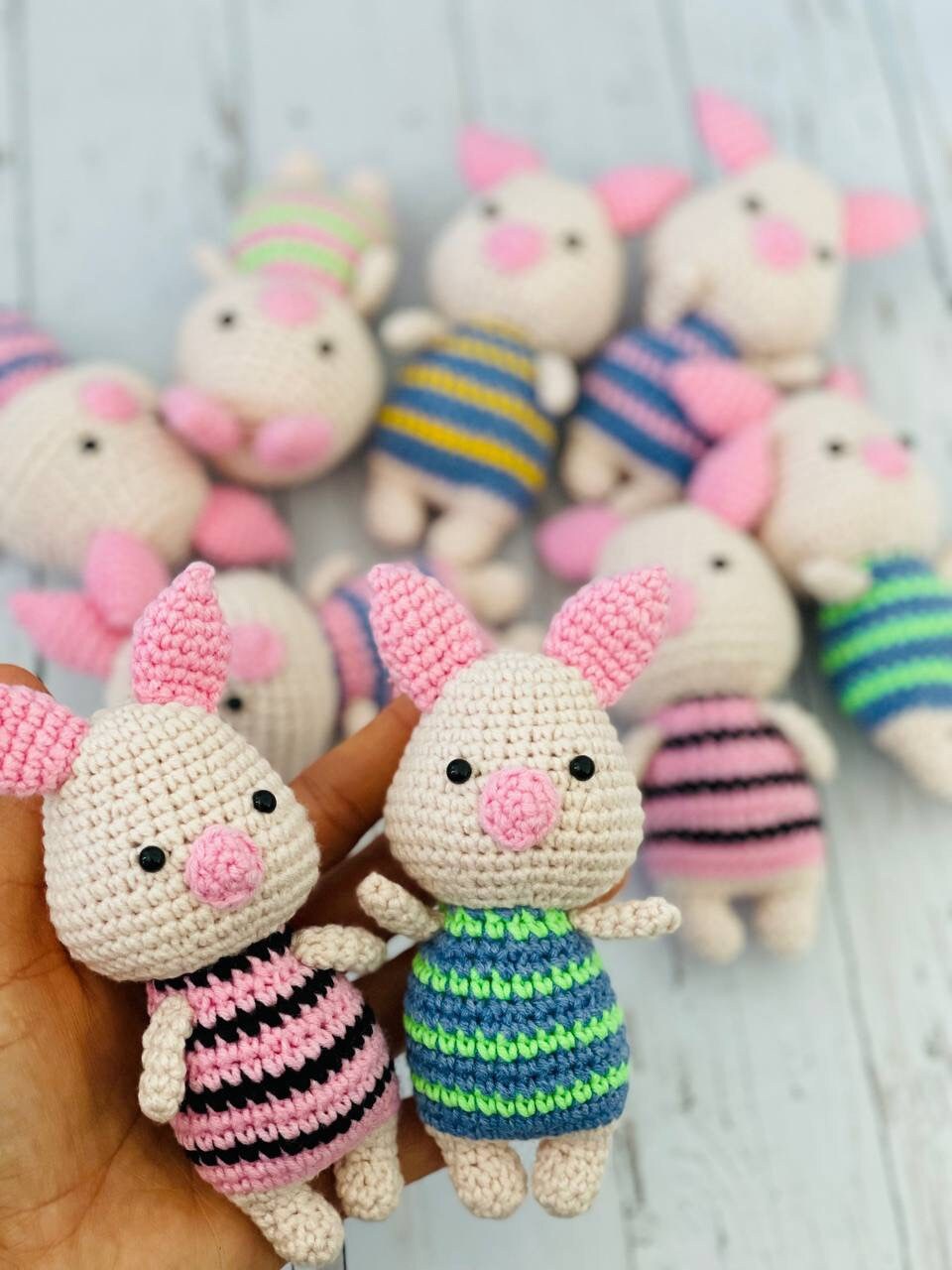 Photo of handmade crochet miniatures cute and colorful animals including a bee, cow, panda, piglet, and koala. Perfect as a unique gift or collectible item.Each crochet animal is crafted using soft yarn and stuffed with hypoallergenic filling