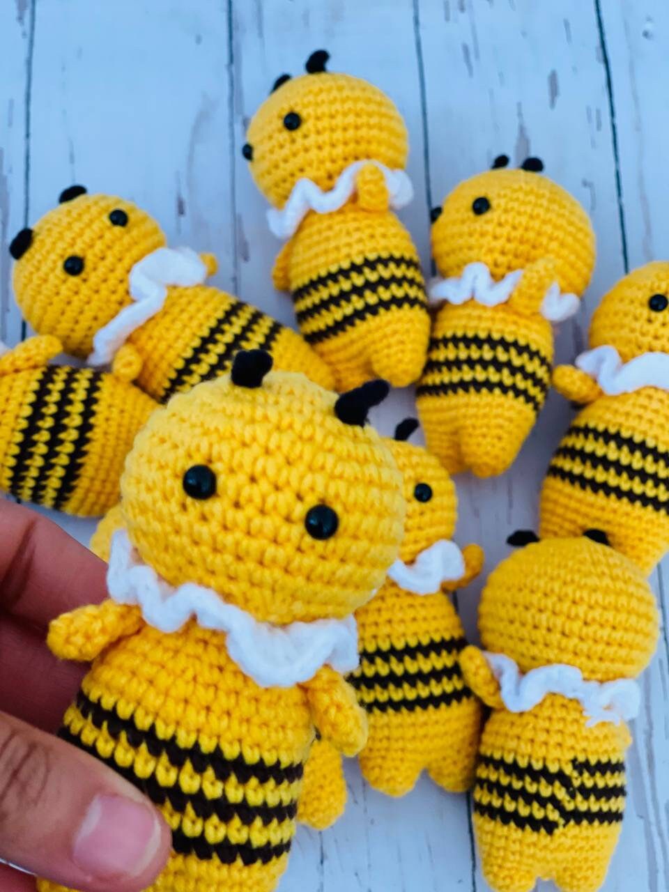 Photo of handmade crochet miniatures cute and colorful animals including a bee, cow, panda, piglet, and koala. Perfect as a unique gift or collectible item.Each crochet animal is crafted using soft yarn and stuffed with hypoallergenic filling