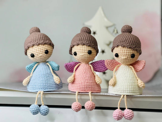 Handmade crochet Flying Fairy in Pink, Blue, or White. Adorable and delicate, perfect for a nursery or girls' room decor. Can be hung from a mobile, ceiling, or wall. Great gift for baby showers, birthdays, and fairy lovers.