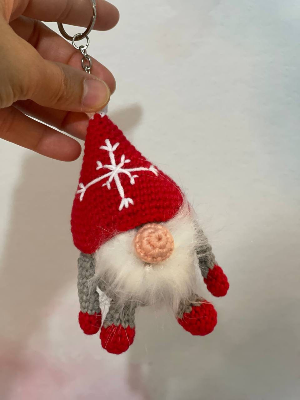 Crochet Gonk Christmas Keychain featuring a cute and colorful Scandinavian gnome with a long hat, fluffy beard, and a small heart detail. Perfect for adding a festive touch to your keys, bags, or as a stocking stuffer. Handmade with love and care.