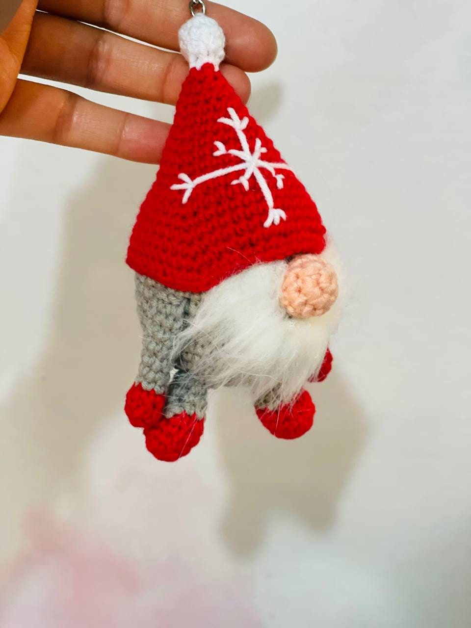 Crochet Gonk Christmas Keychain featuring a cute and colorful Scandinavian gnome with a long hat, fluffy beard, and a small heart detail. Perfect for adding a festive touch to your keys, bags, or as a stocking stuffer. Handmade with love and care.