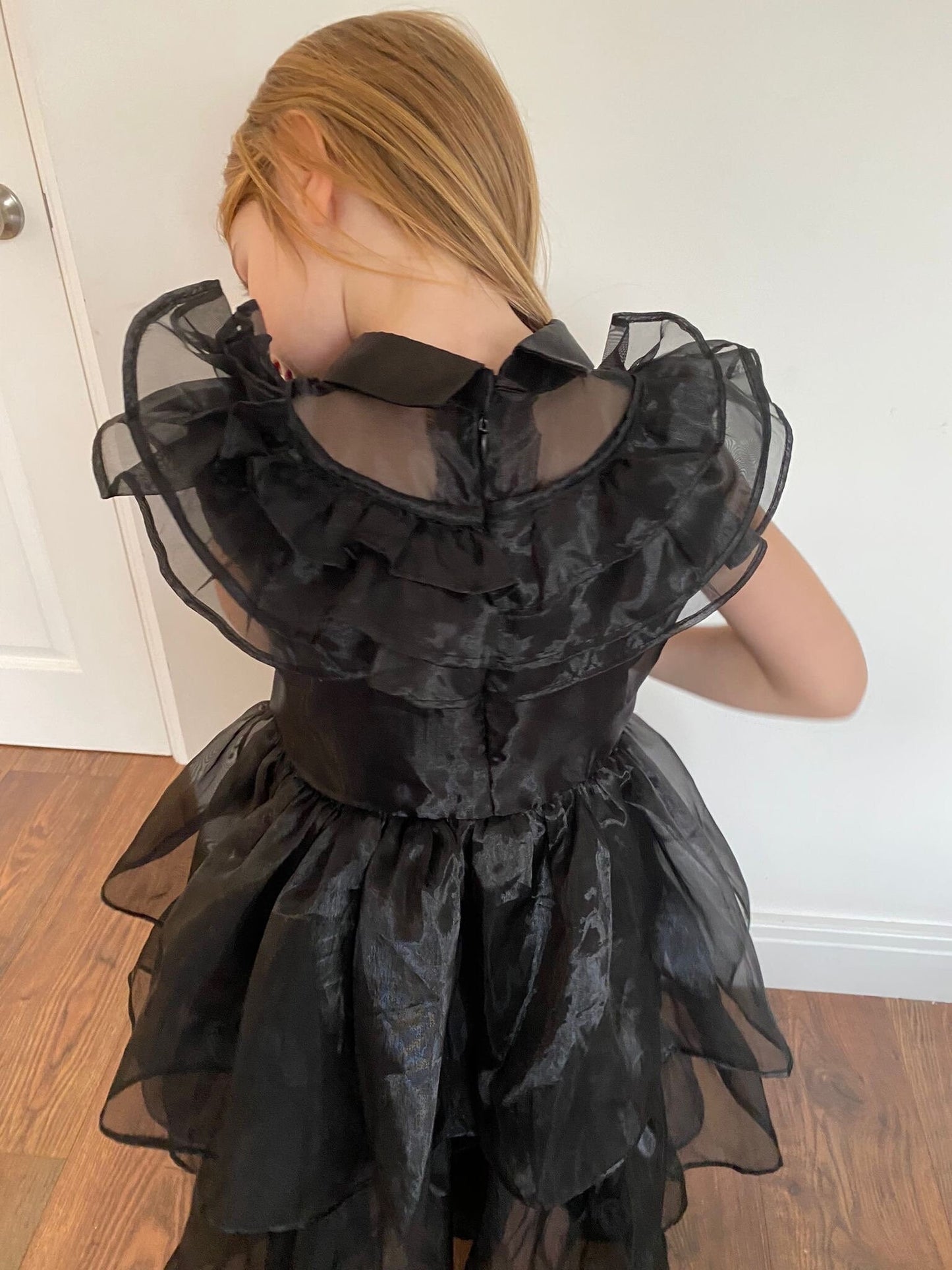 Tailor Made Black Dance Costume for Wednesday Addams inspired from the Addams Family. The costume is made to fit perfectly. The entire costume is made from high-quality black fabric.Perfect for Halloween parties, dance performances, or cosplay events