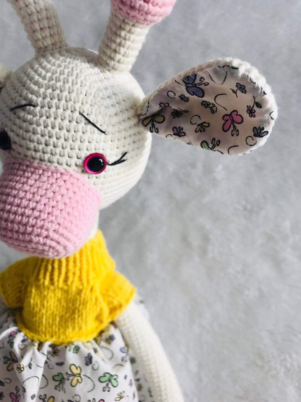 Hand-crocheted Princess Lady Giraffe Toy with a soft, fuzzy texture and long, floppy ears