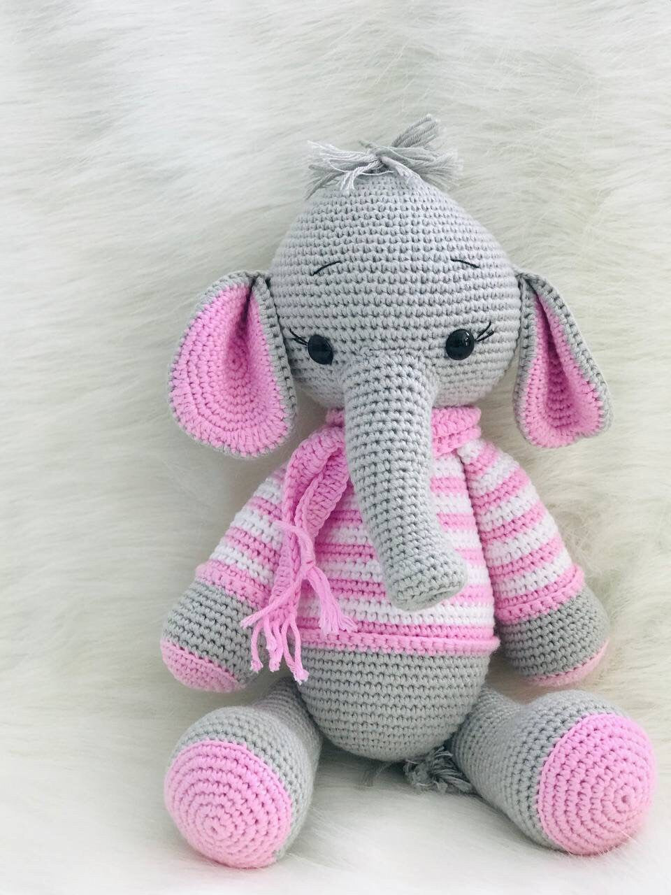 A charming crochet elephant toy with a detailed, hand-stitched finish