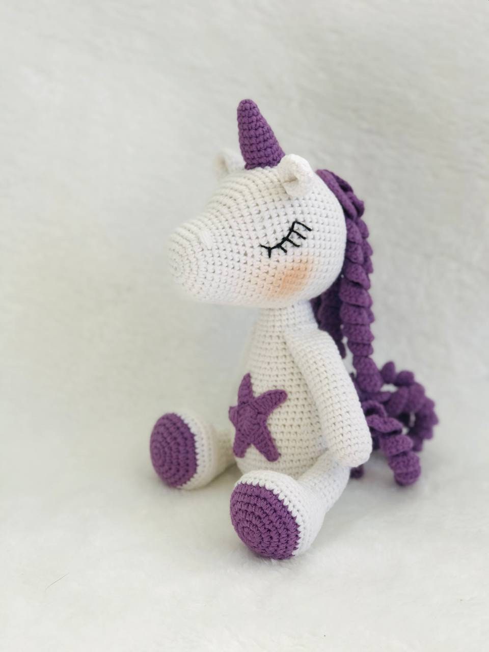 UKCA approved crochet unicorn toy, safe for children to cuddle and play with