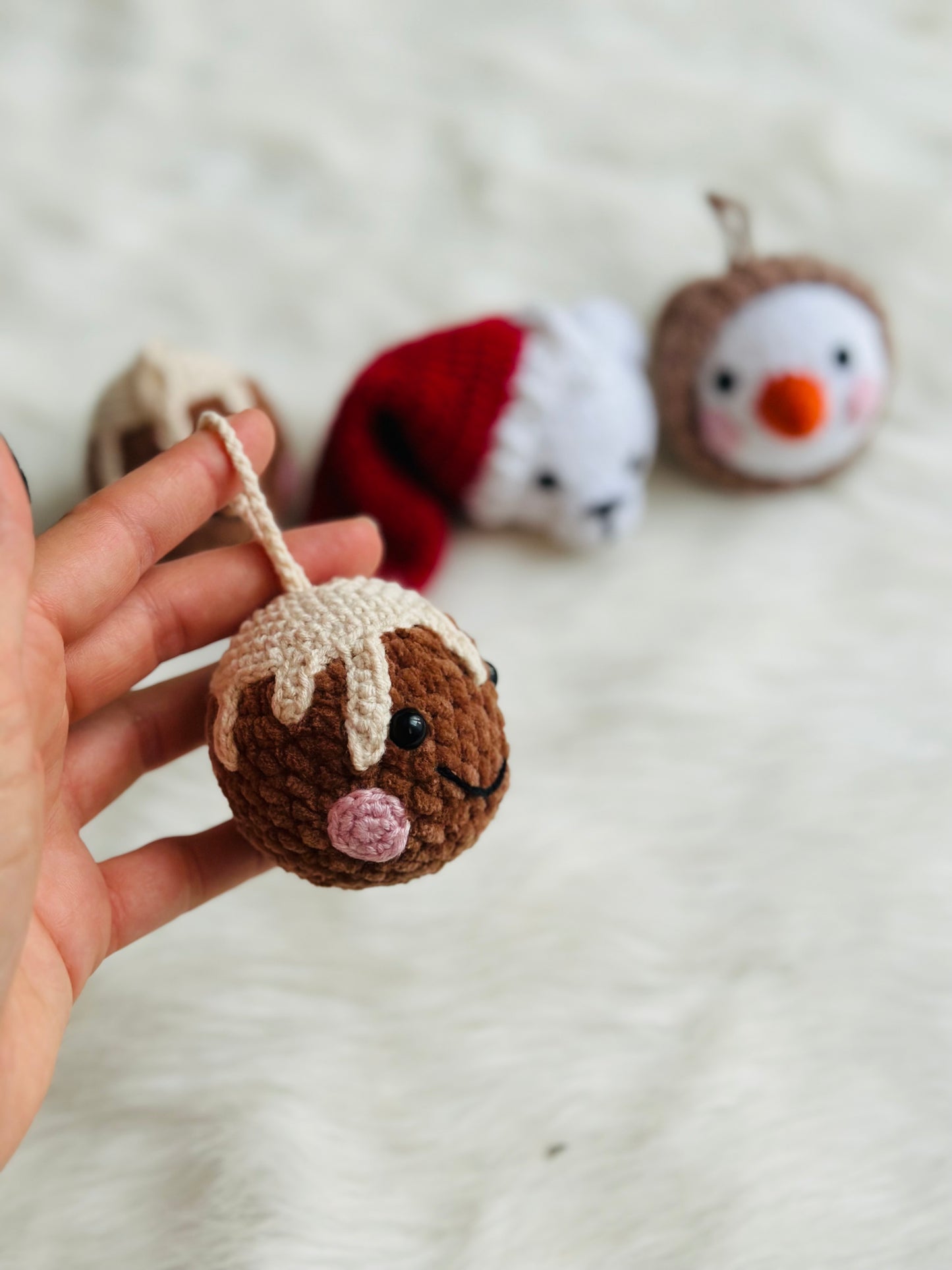 Cute crochet snowman, pudding, penguin , polar bear tree decorations .