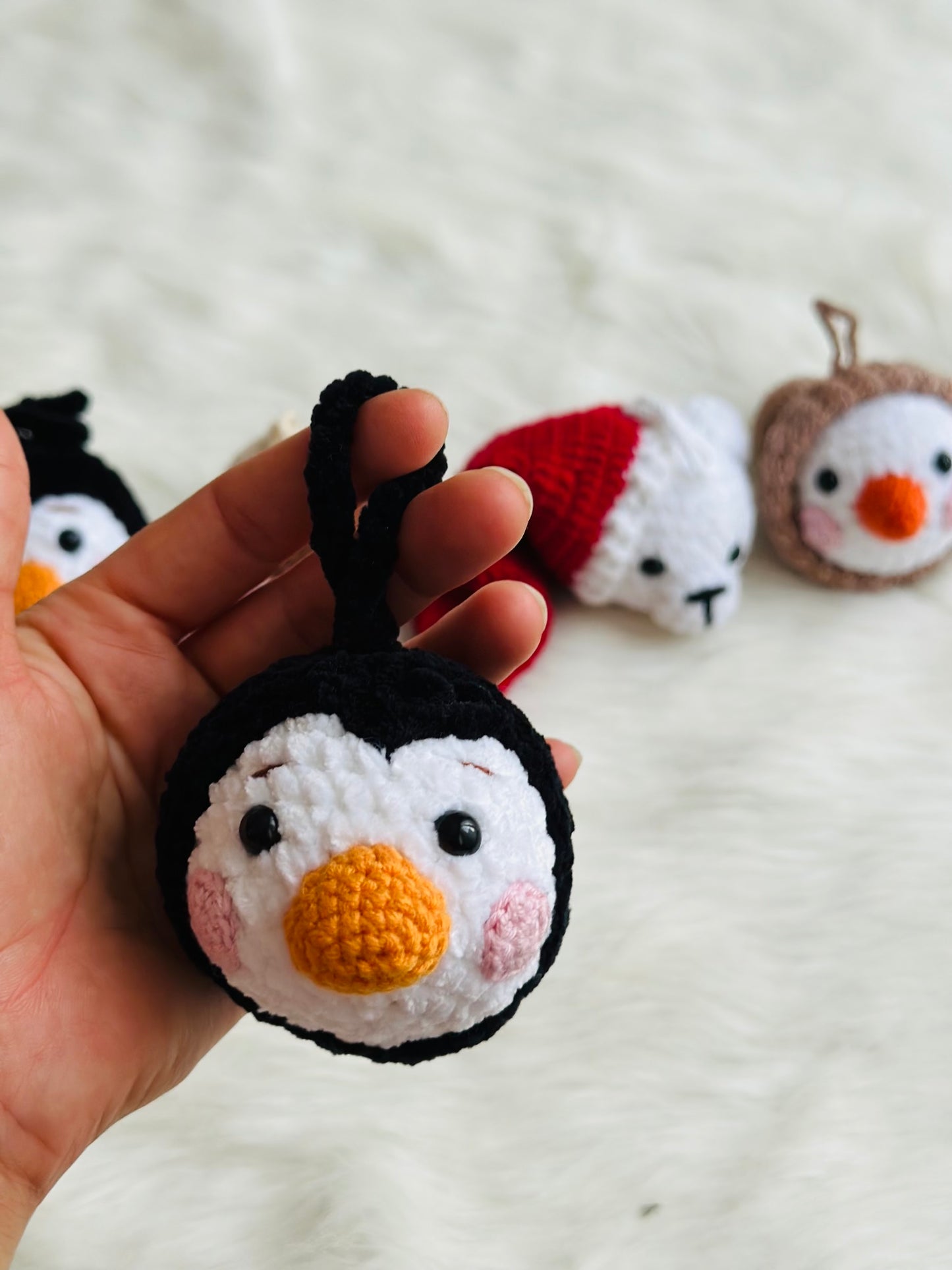 Cute crochet snowman, pudding, penguin , polar bear tree decorations .