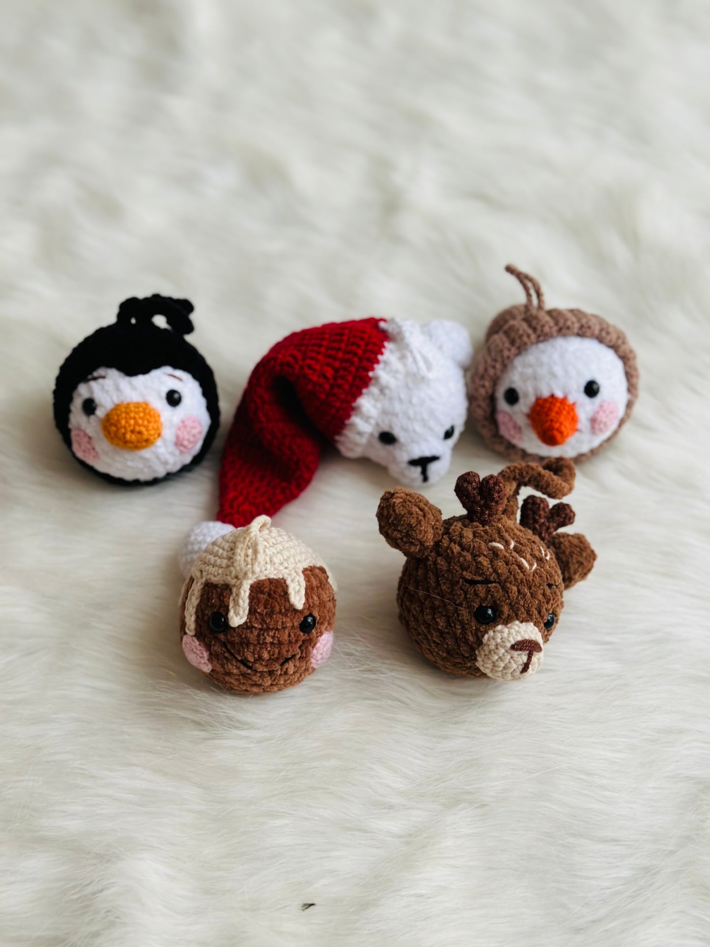 Cute crochet snowman, pudding, penguin , polar bear tree decorations .