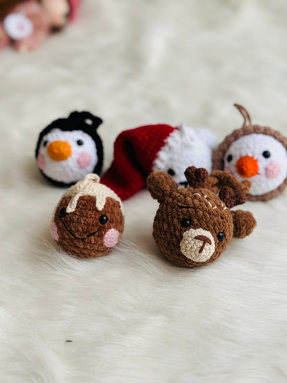 Cute crochet snowman, pudding, penguin , polar bear tree decorations .