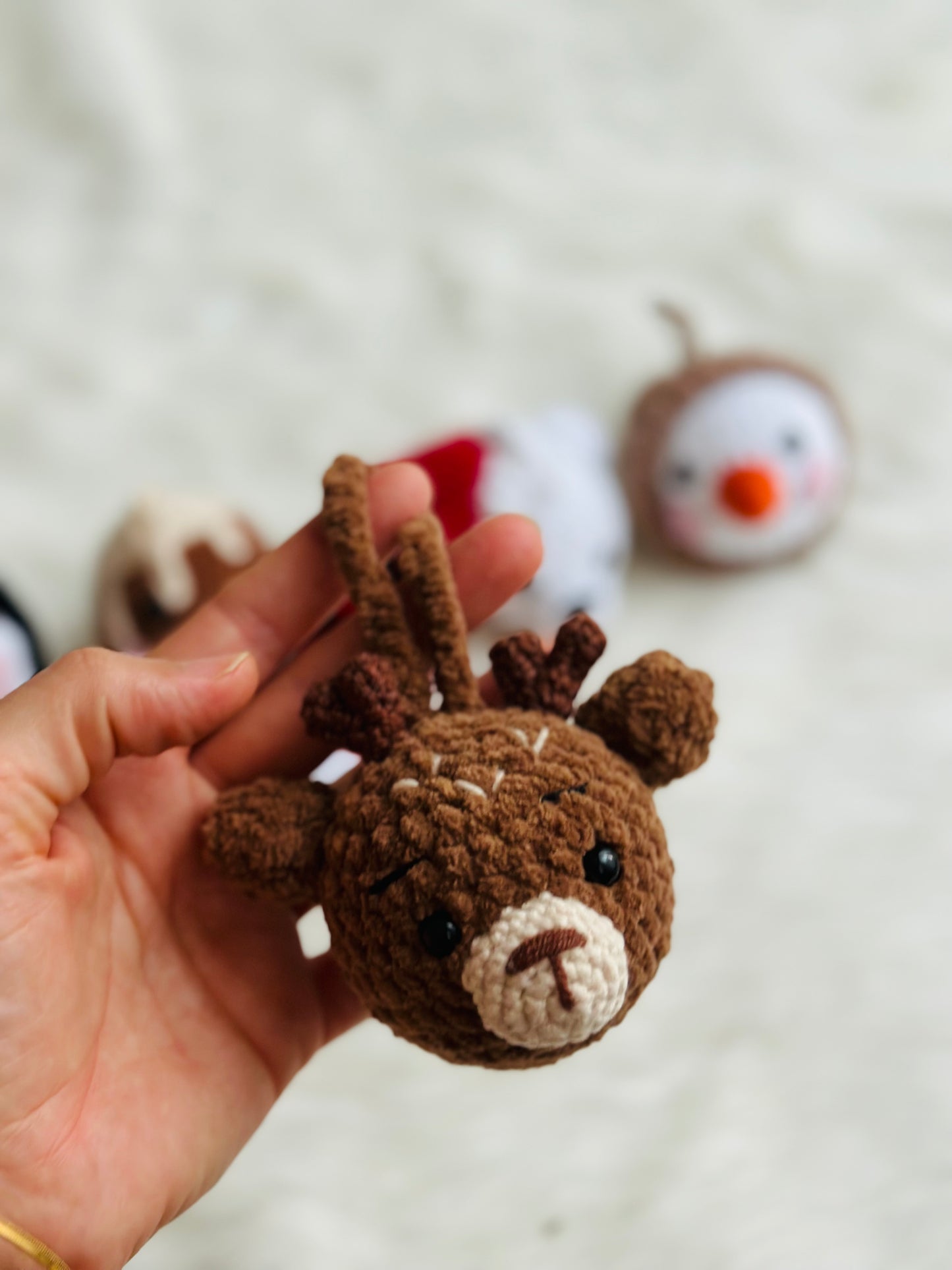 Cute crochet snowman, pudding, penguin , polar bear tree decorations .