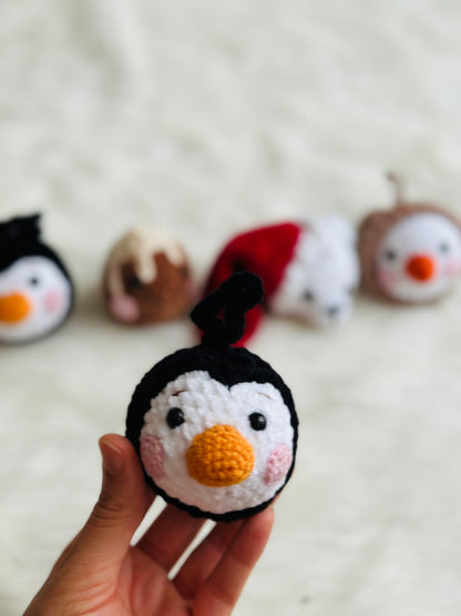 Cute crochet snowman, pudding, penguin , polar bear tree decorations .