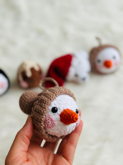 Cute crochet snowman, pudding, penguin , polar bear tree decorations .