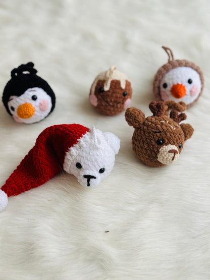 Cute crochet snowman, pudding, penguin , polar bear tree decorations .