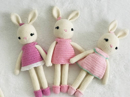 A collection of handmade bunnies in dreamy pastel hues, perfect for spring