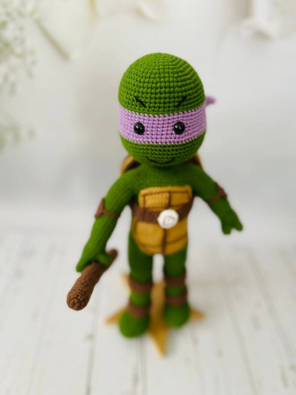 Handmade crochet versions of Leonardo, Michelangelo, Donatello, and Raphael, ready for action.