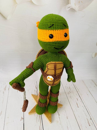 Artisan crochet figures of the TMNT, each with their unique color mask and personality.