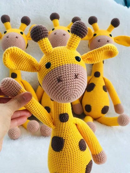 The crocheting is intricate, with the tan and brown shades working together to make an accurate representation of a real giraffe. The full-sized plush toy stands almost 40 cm tall. This will fit right into safari theme decor