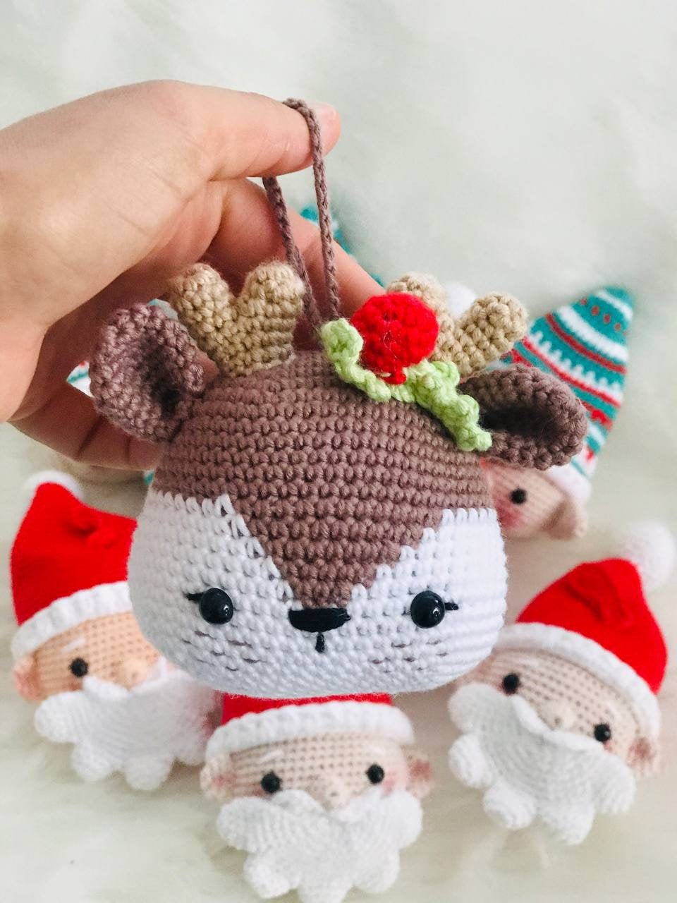 Handmade Crochet Christmas Decorations featuring Santa Claus, Elf, Pudding, Reindeer. These cute and colorful ornaments are sure to bring joy to your Christmas celebrations. Great as a gift or for adding to your own collection.