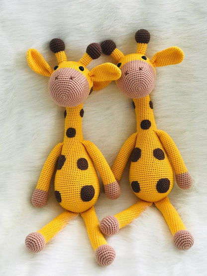 The crocheting is intricate, with the tan and brown shades working together to make an accurate representation of a real giraffe. The full-sized plush toy stands almost 40 cm tall. This will fit right into safari theme decor