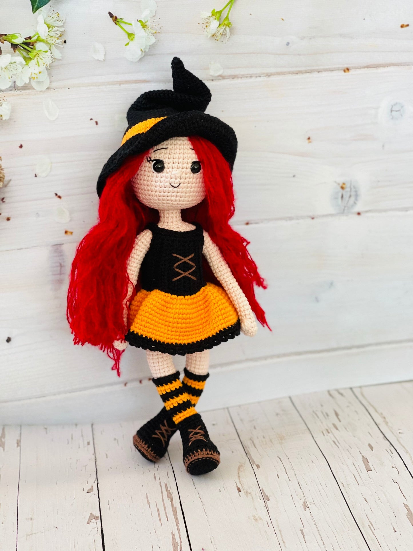 Handmade Crochet Halloween Witch with Broomstick, Pointy Hat and Purple Dress. Perfect for Spooky Season. Unique and One of a Kind Decoration for Your Home or Office. Made with High-Quality Materials and Great Attention to Detail.Halloween