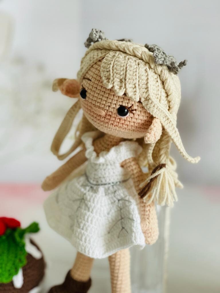 Handmade Crochet Snow Princess doll with white dress and tiara,Cute and cuddly Crochet Snow Princess with blonde hair,Adorable Snow Princess Crochet doll for kids and collectors,Soft and huggable Crochet Snow Princess toy with sparkly accents