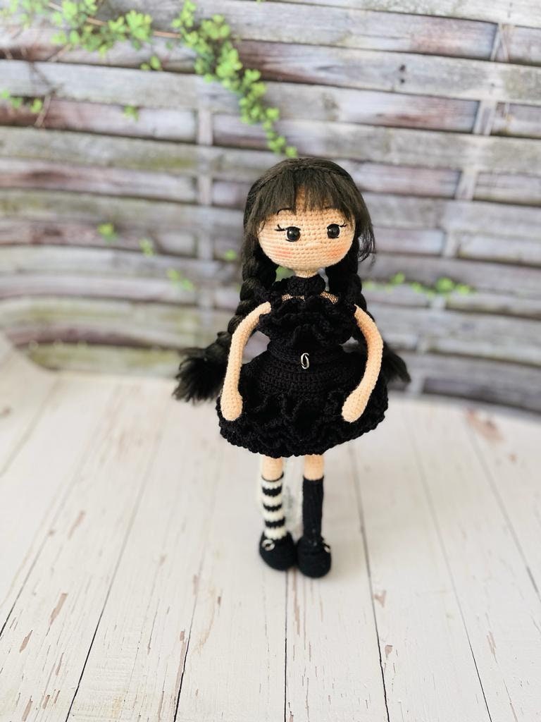 Beautifully crocheted Wednesday Raven dresses special black costume for party. The detail on this crochet is exquisite. Her dress is black and has got lots of details. Her arms are made with wire to enable the movement for her famous dance.