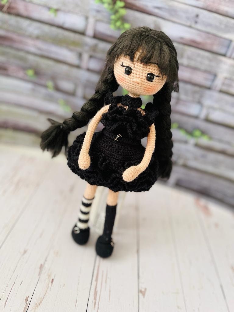 Beautifully crocheted Wednesday Raven dresses special black costume for party. The detail on this crochet is exquisite. Her dress is black and has got lots of details. Her arms are made with wire to enable the movement for her famous dance.