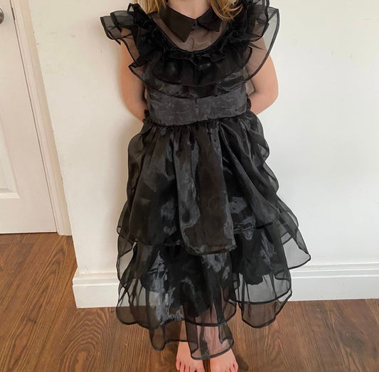 Tailor Made Black Dance Costume for Wednesday Addams inspired from the Addams Family. The costume is made to fit perfectly. The entire costume is made from high-quality black fabric.Perfect for Halloween parties, dance performances, or cosplay events