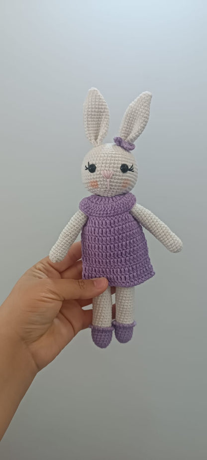 A collection of handmade bunnies in dreamy pastel hues, perfect for spring.