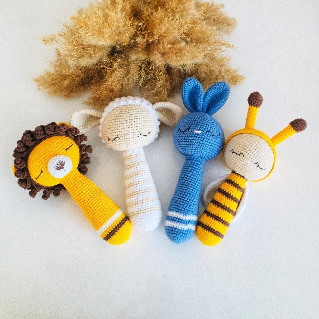 "UKCA tested crochet bee toy made with Oeko Tex yarn, ensuring safety and durability.